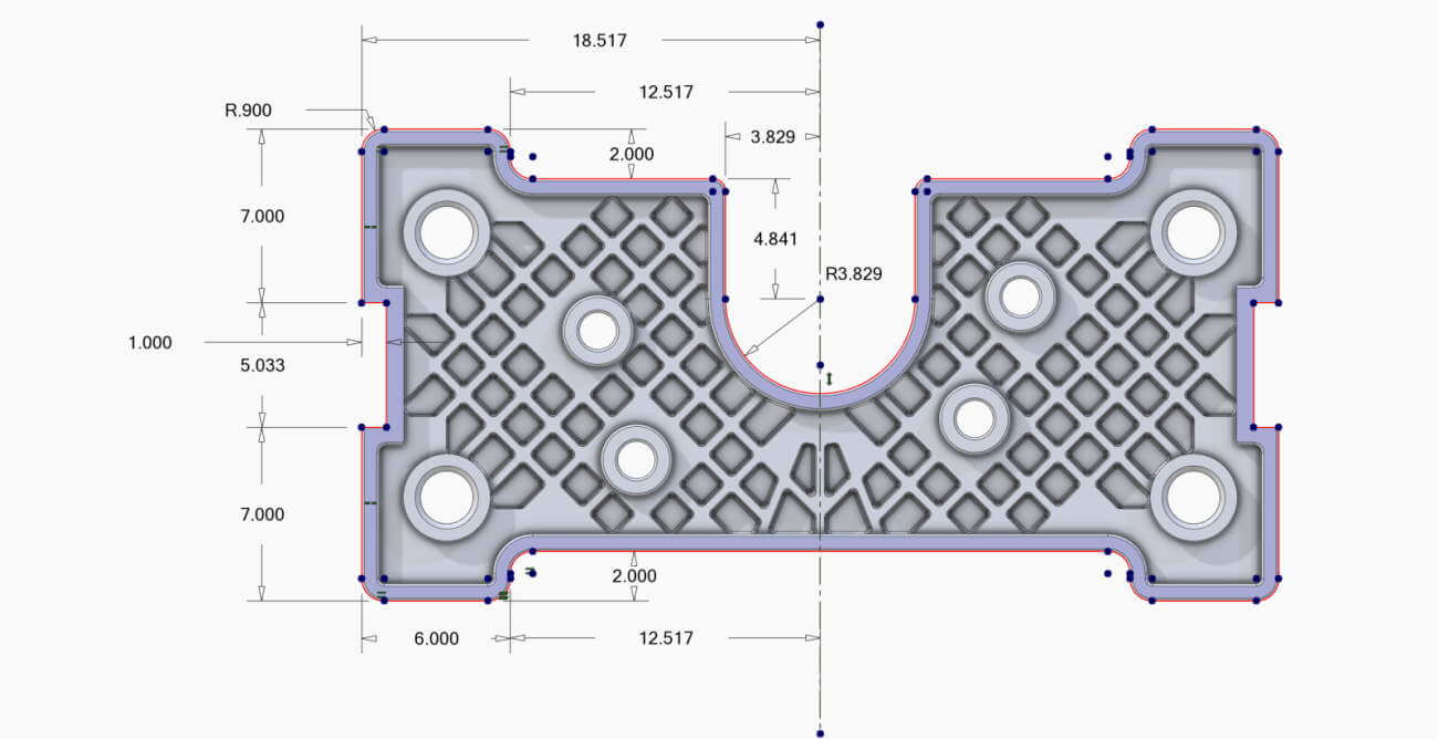 Eine 2D-Skizze, die die allgemeine Form dieses Teils bestimmt. Es muss nur eine Seite definiert werden, da eine Spiegelungsoperation verwendet wird.